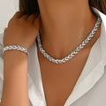 A Set Featuring a Luxurious Sparkling Necklace And a Bracelet, Designed Elegantly with Rhinestone Fish Tail Shapes, Perfect for Significant Women'S Events, Parties, And Everyday Use, Making for Stunning Jewelry Gifts