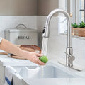 One Kitchen Faucet Featuring a Pull-Down Spray, Single Handle, And High Arc Design Made of Commercial-Grade Stainless Steel with a Brushed Nickel Finish. It Includes a Deck Plate And Is Ideal for Use in Bars, Laundry Rooms, Rvs